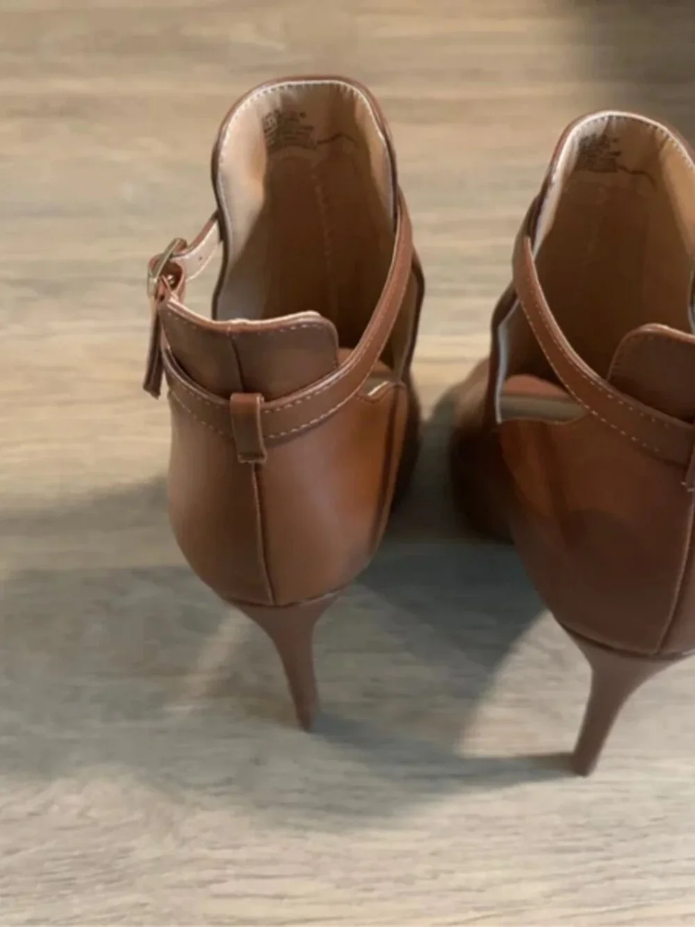 Carmel peak-a-boo boot heels